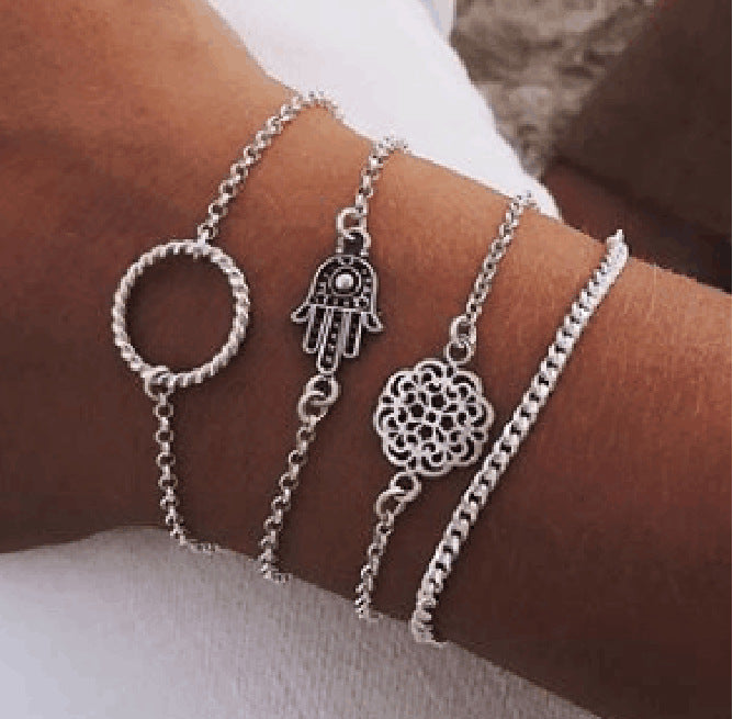 Hollow Pattern Palm Twist Bracelet Four-piece Set