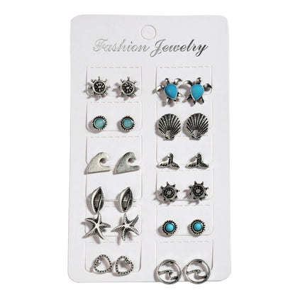 12 pairs of turtle, starfish and shell earrings