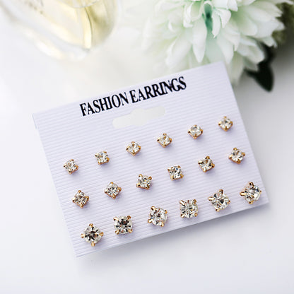 Set of 9 pairs of four-claw zircon earrings