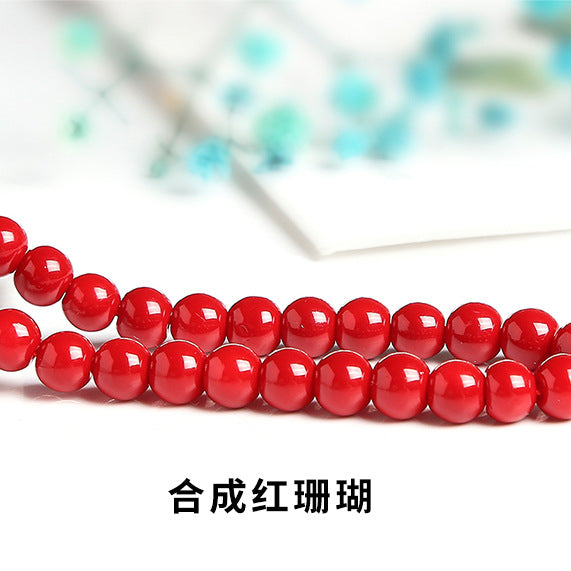 Red lacquered synthetic beads