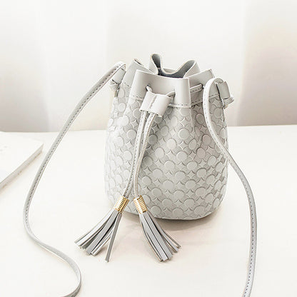 Embossed double fringed bucket bag