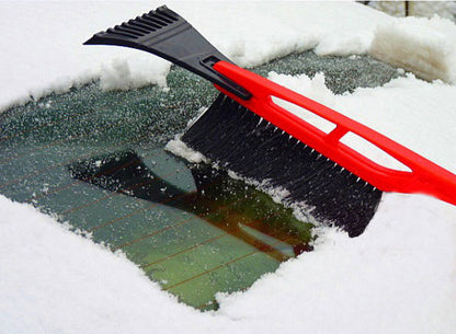 Deicing shovel with brush