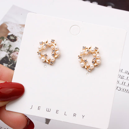 Imitation pearl garland rhinestone earrings