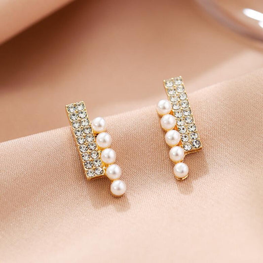 Imitation pearl diamond stud earrings