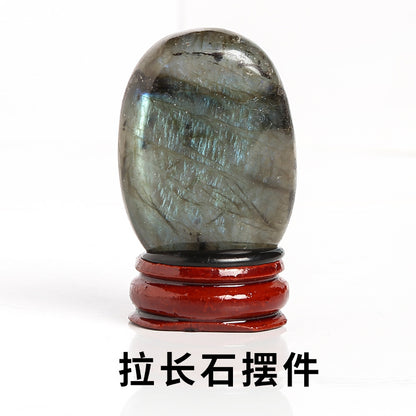 elongated stone rough stone colorful ore