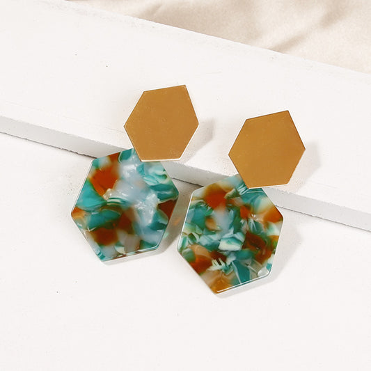 Pendientes sencillos de metal con rombos hexagonales 