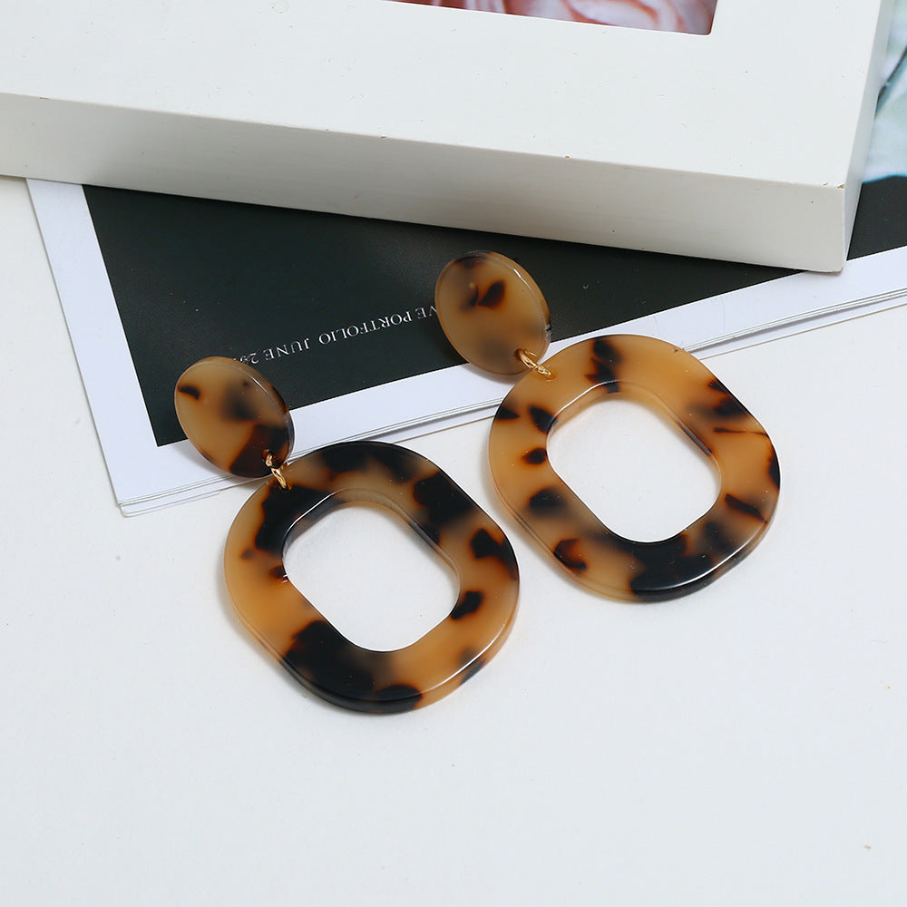 Square acetate earrings are minimal