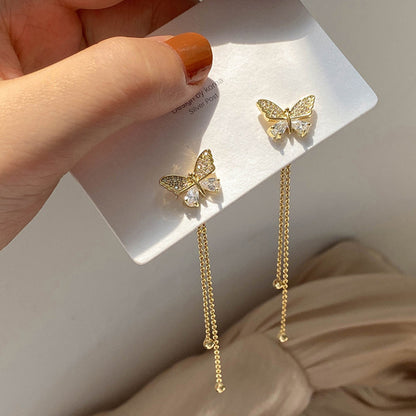 One pair of long butterfly stud earrings.