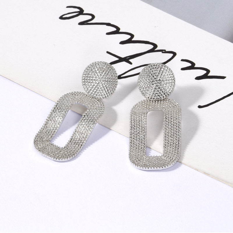 Geometric stud earrings with oval texture