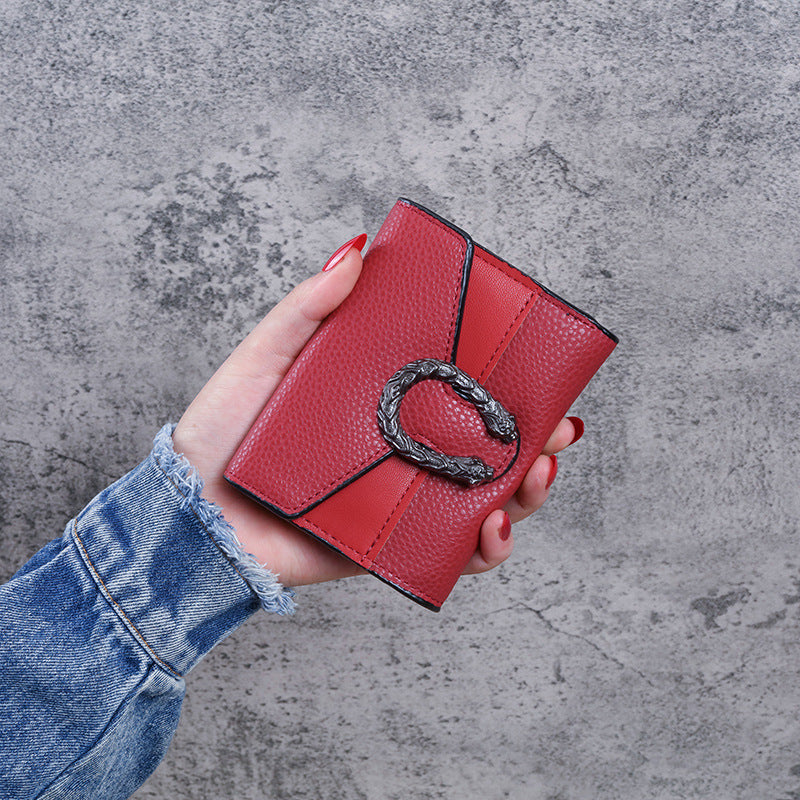 Tri-fold clutch multi-purpose wallet