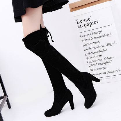 Over-the-knee boots and high heels