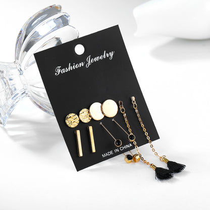 Set of five pairs of round vertical diamond tassels