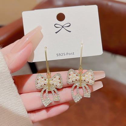 Bow pearl earrings for women