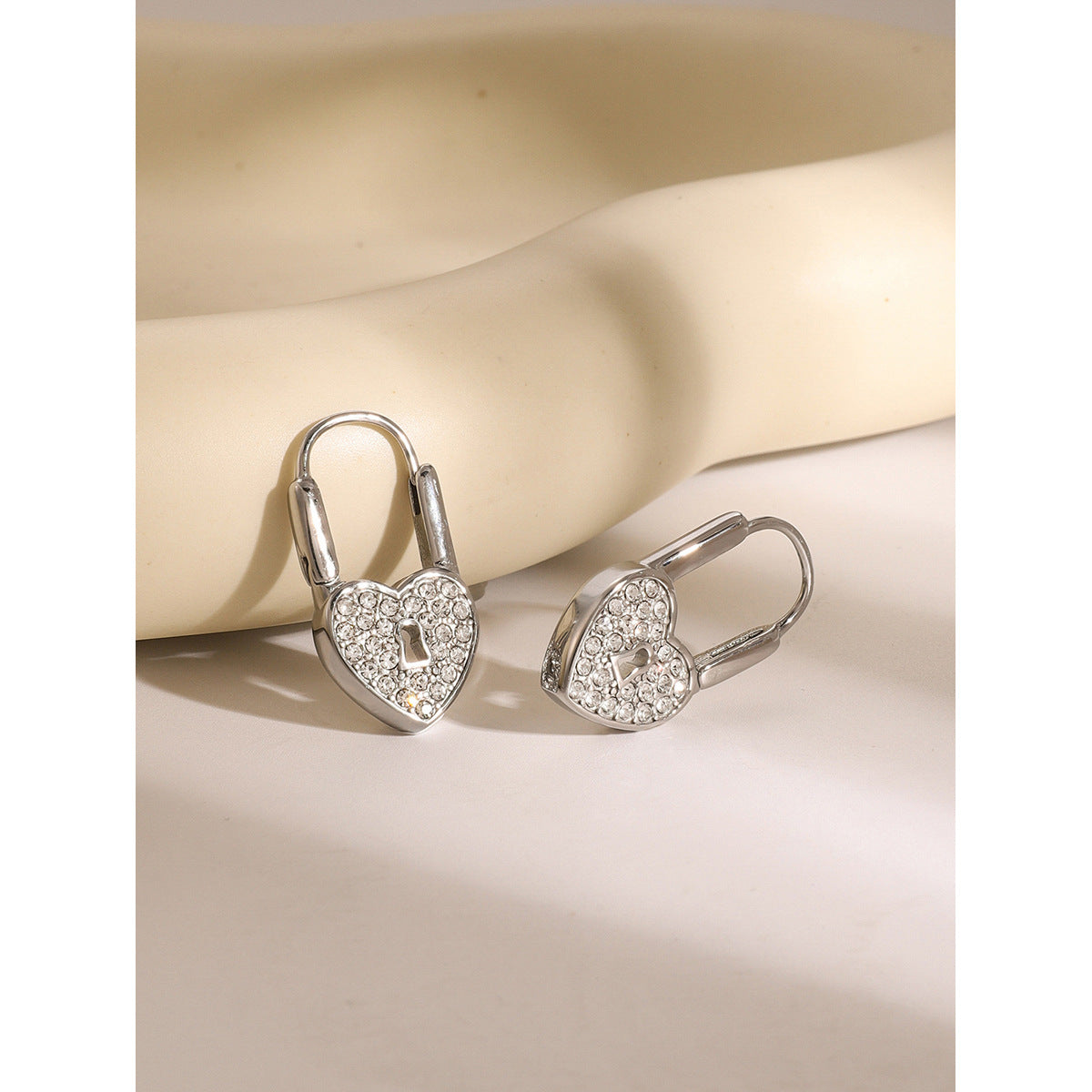 Heart lock shaped rhinestone titanium steel earrings