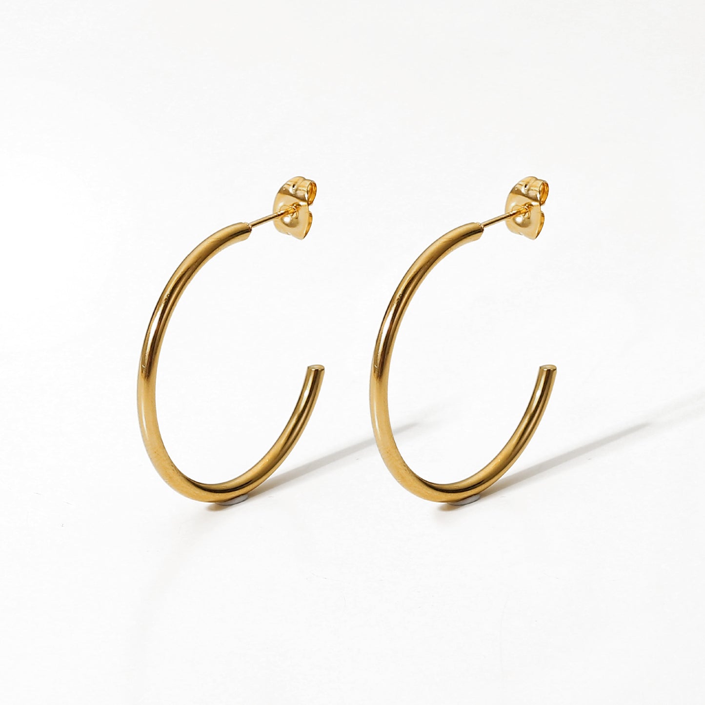 C-shaped titanium steel earrings