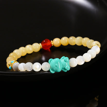 Natural white pearl shell rice topaz mixed bracelet.