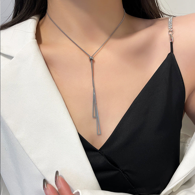 Geometric triangle pendant necklace