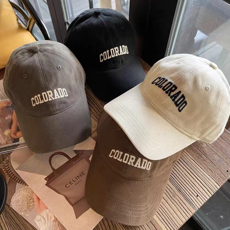 Gorra de béisbol con letras lavadas y ala ancha 