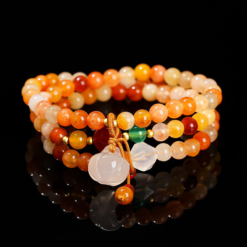 Golden silk jade multi-ring bracelet