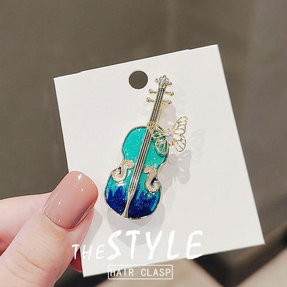 Blue violin brooch