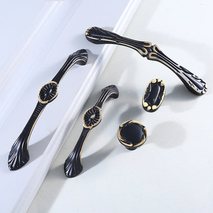 Black and yellow antique cabinet door handle