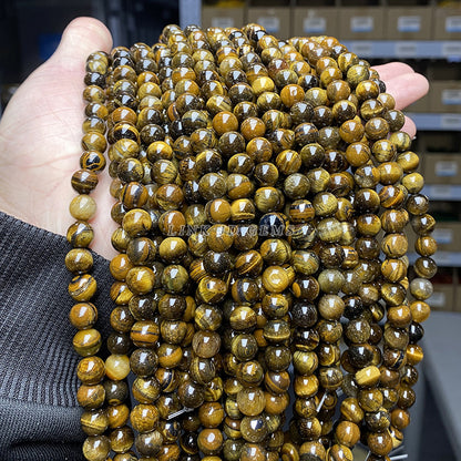 Perlas sueltas de piedra de ojo de tigre amarilla natural de grado A 