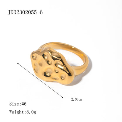 Irregular hammer pattern asymmetric ring