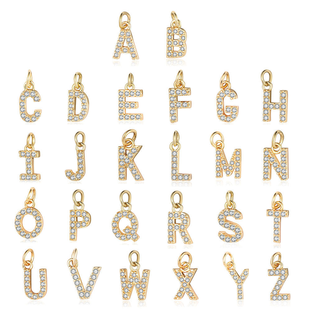 Copper zircon yellow gold letter pendant.