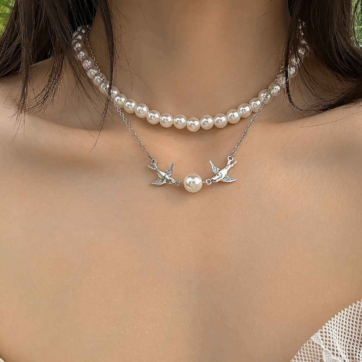 Temperament imitation pearl bird necklace