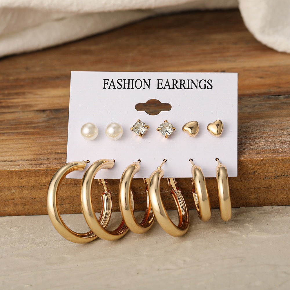 Metal C-shaped earrings set 6 pieces