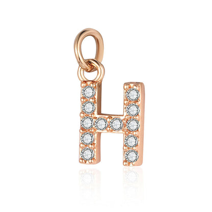 26 rose gold English letter copper zircon pendants.