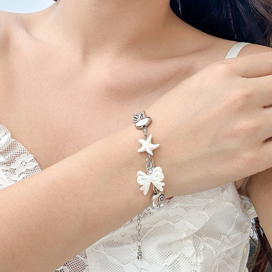 Conjunto versátil de pulseras y bisutería con estrellas de mar 