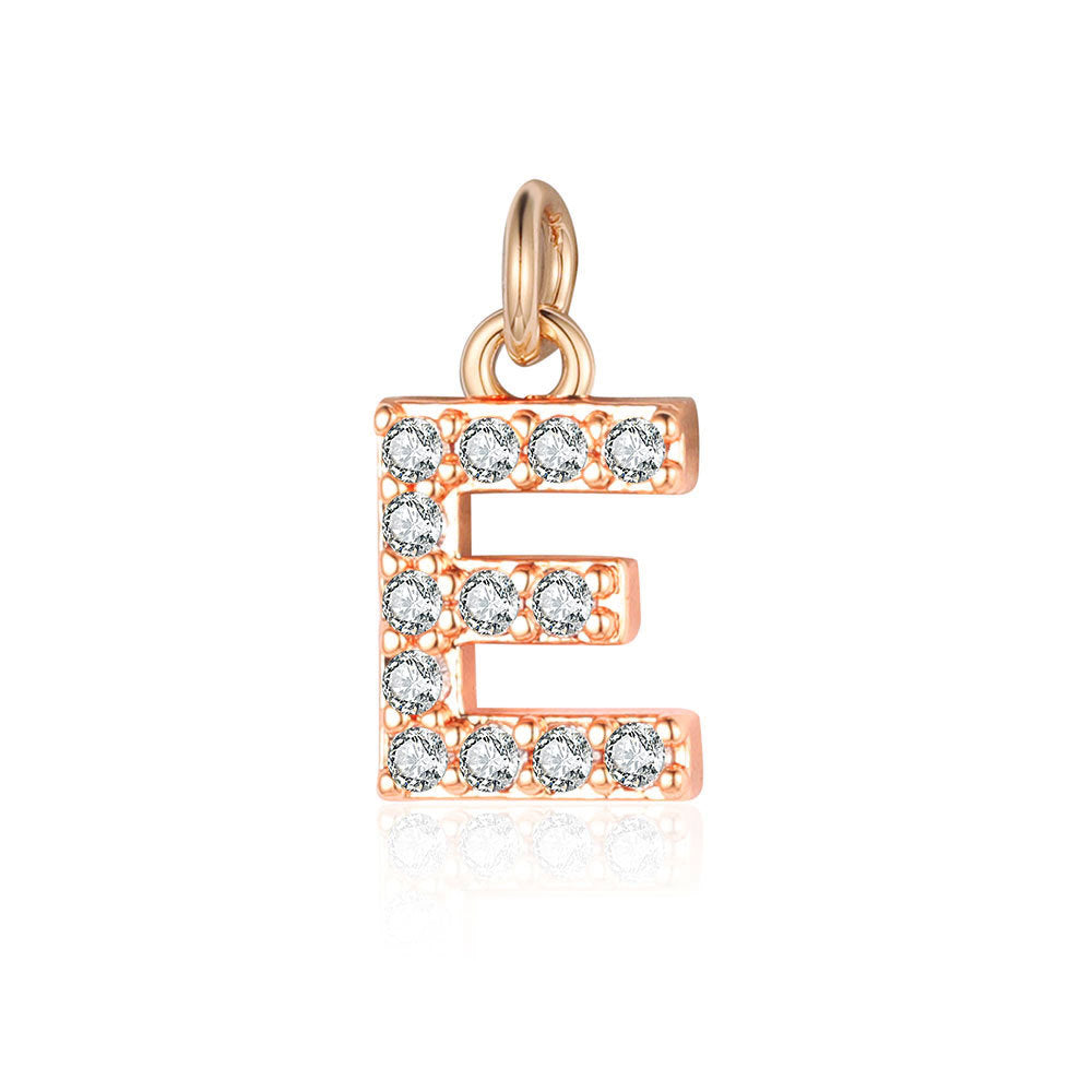 26 rose gold English letter copper zircon pendants.