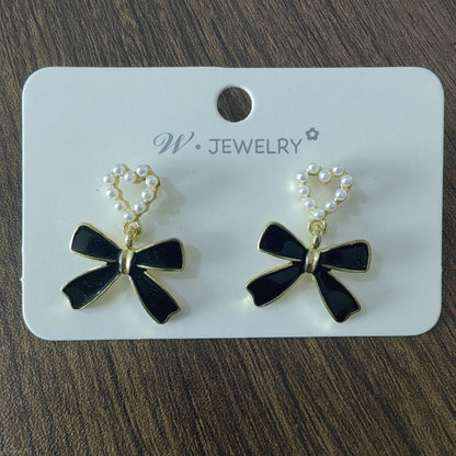 Bow drip earrings