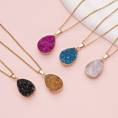 Electroplated crystal tooth teardrop-shaped stainless steel pendant necklace