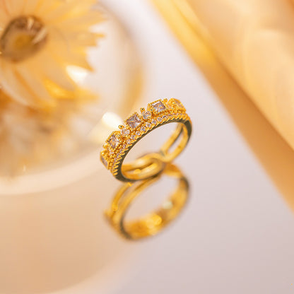 Real gold electroplated zircon ring.