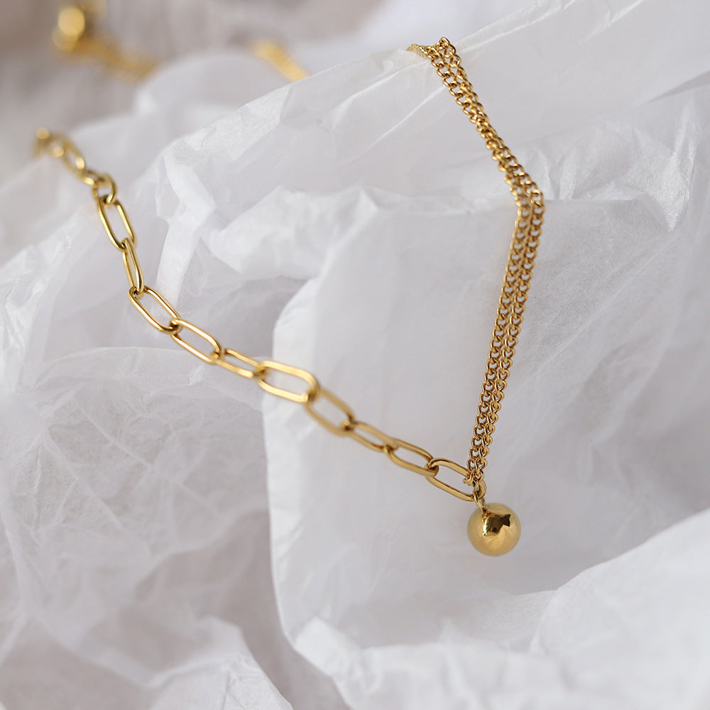 Splicing golden ball necklace