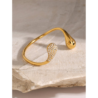 Asymmetric teardrop rhinestone cuff bracelet