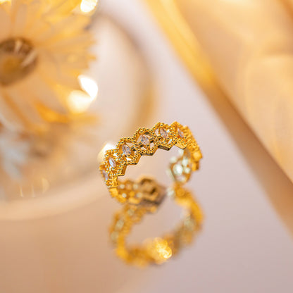 Real gold electroplated zircon ring.