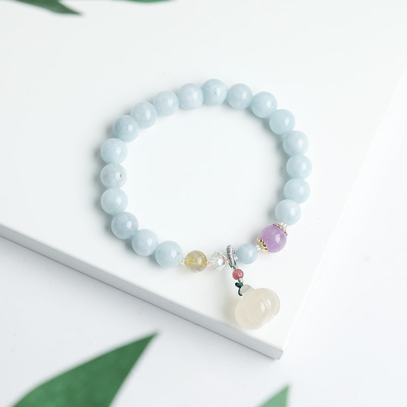 Blue chalcedony bracelet, white jade pumpkin bead pendant.