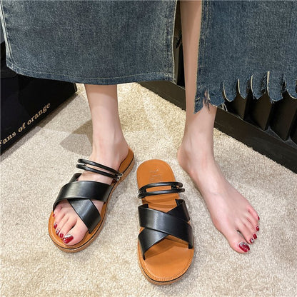 Two crossed platform slippers