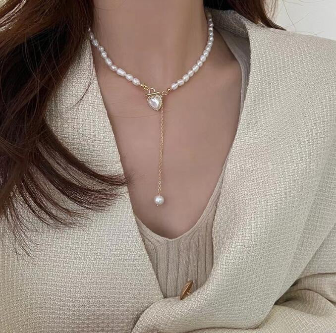 Women's elegant heart pendant pearl necklace