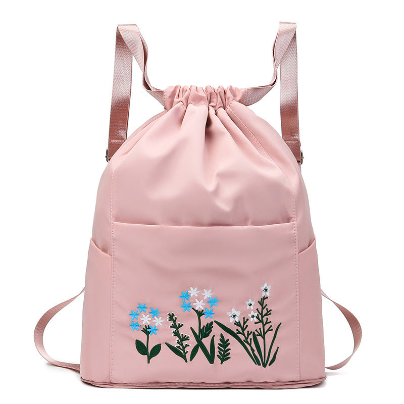 Foldable embroidered travel bag