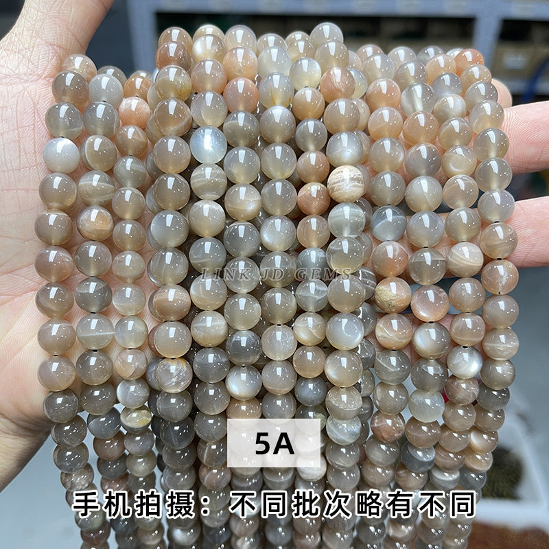 5A natural black backbone sunstone round beads