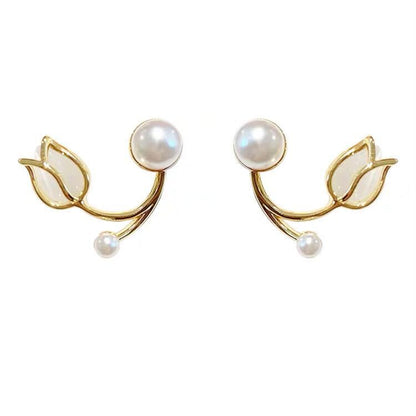 A pair of tulip flower pearl stud earrings.