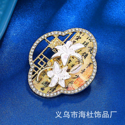 Window grilles brooch