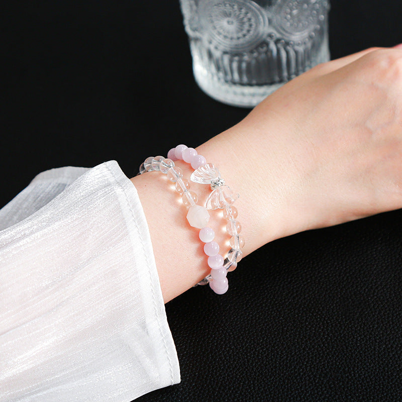 Natural purple lithium light with white crystal butterfly bracelet.