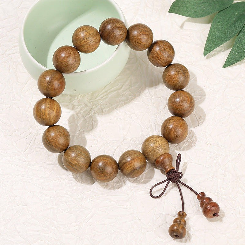 Green sandalwood bead bracelet.