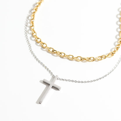 Cross pendant stacked with titanium steel necklace