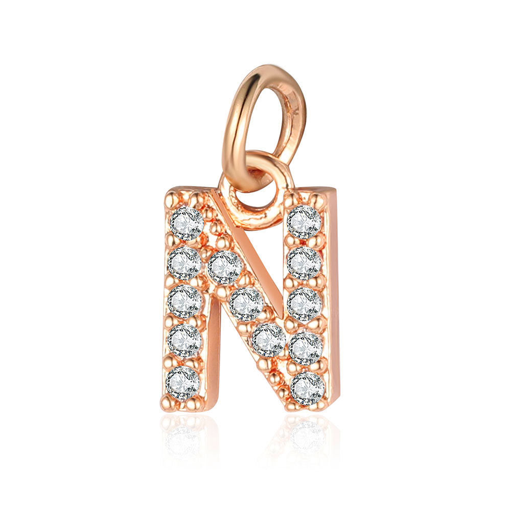 26 rose gold English letter copper zircon pendants.